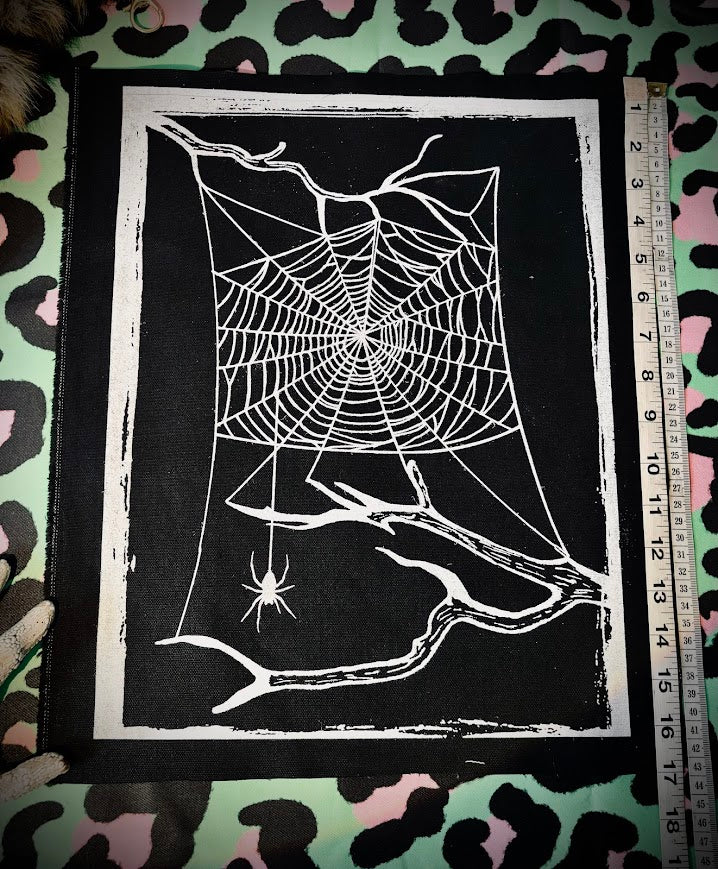 large spider web back patch.