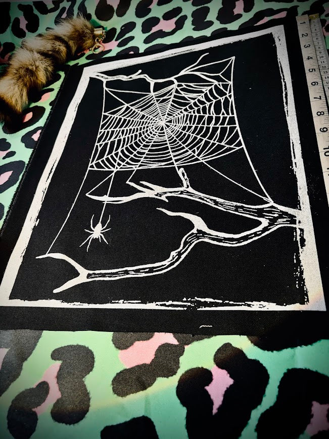 large spider web back patch.