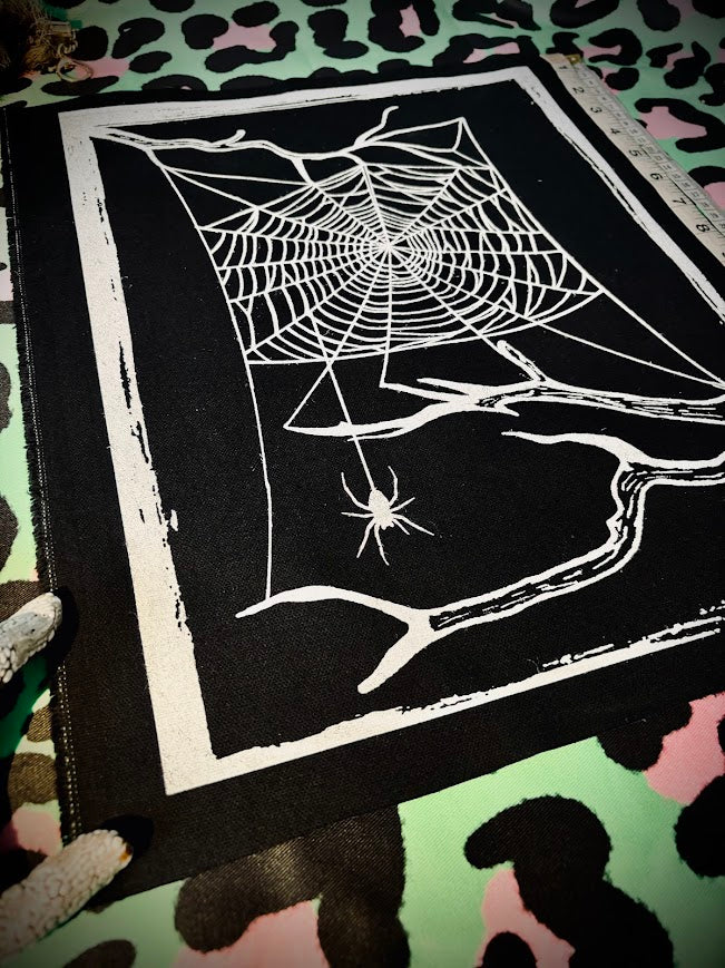 large spider web back patch.