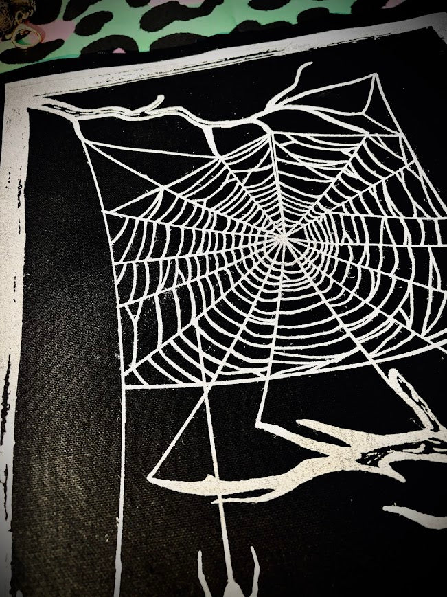 large spider web back patch.