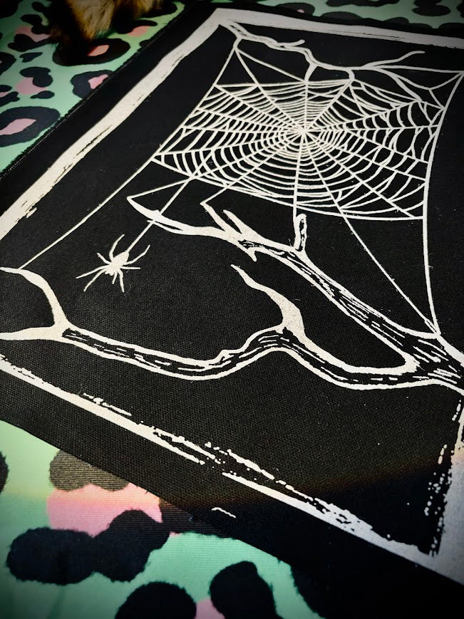 large spider web back patch.