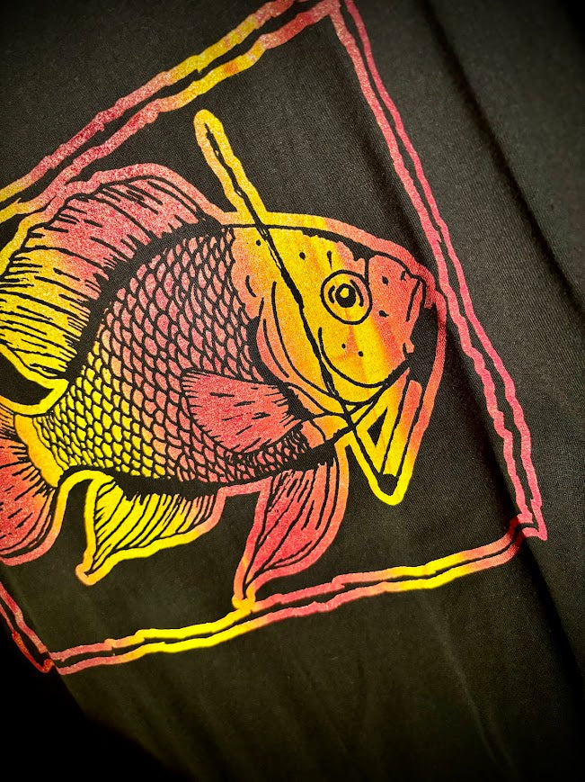 Fish smoking a cigarette on a t-shirt.