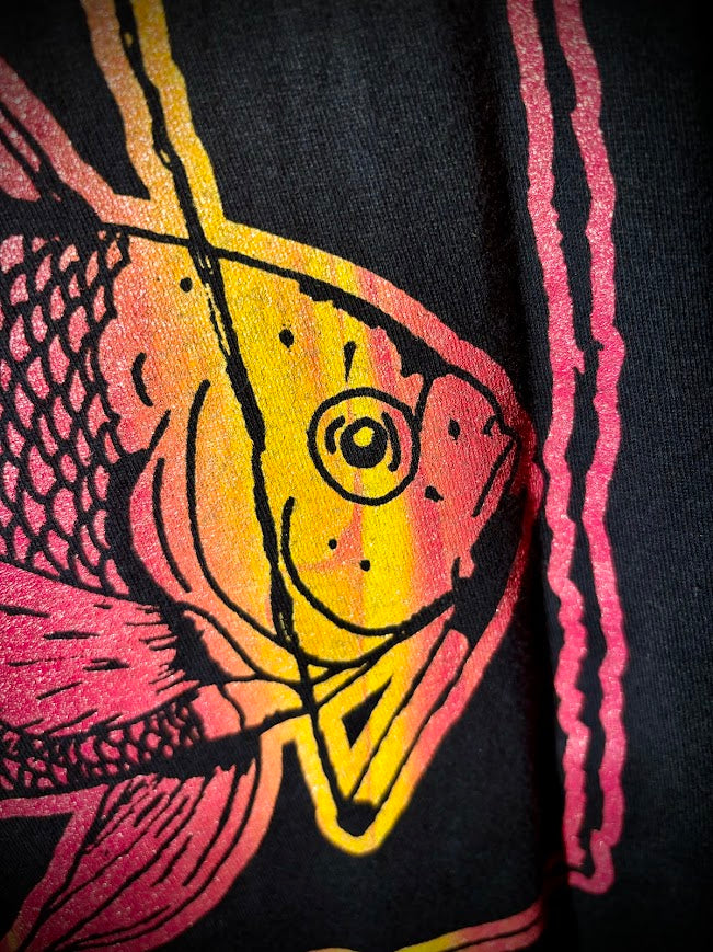 Fish smoking a cigarette on a t-shirt.
