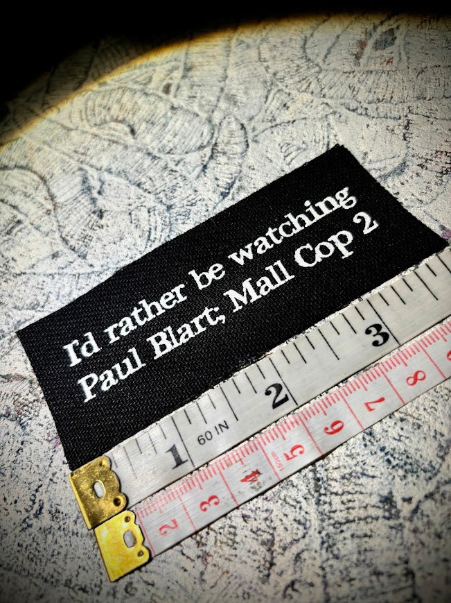 I'd rather be watching Paul Blart Mall Cop 2 sew on patch.