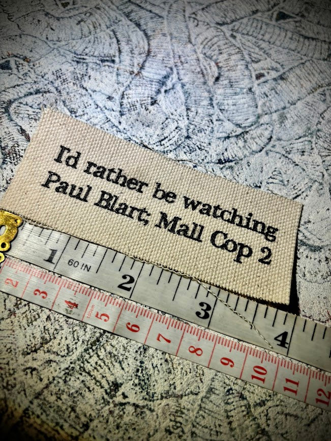 I'd rather be watching Paul Blart Mall Cop 2 sew on patch.