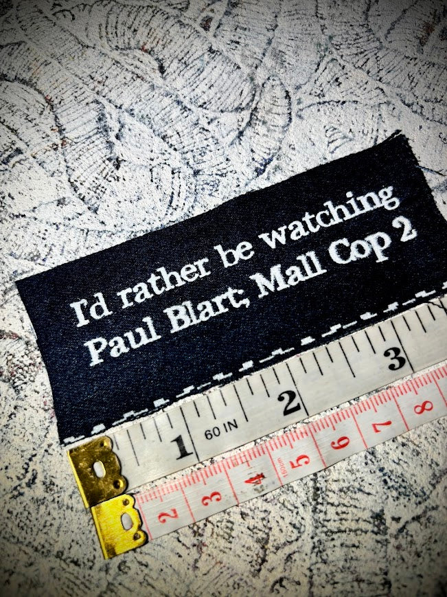I'd rather be watching Paul Blart Mall Cop 2 sew on patch.