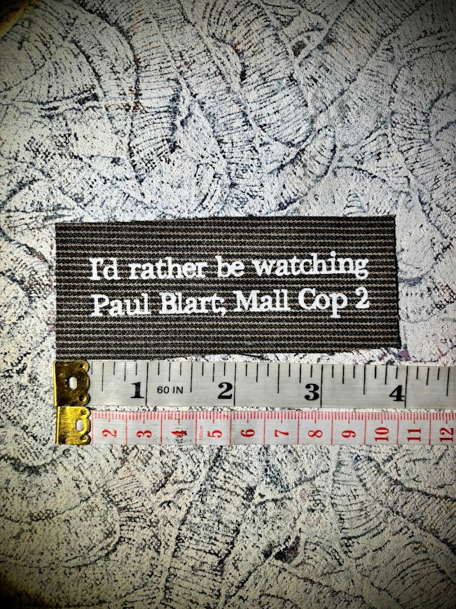 I'd rather be watching Paul Blart Mall Cop 2 sew on patch.