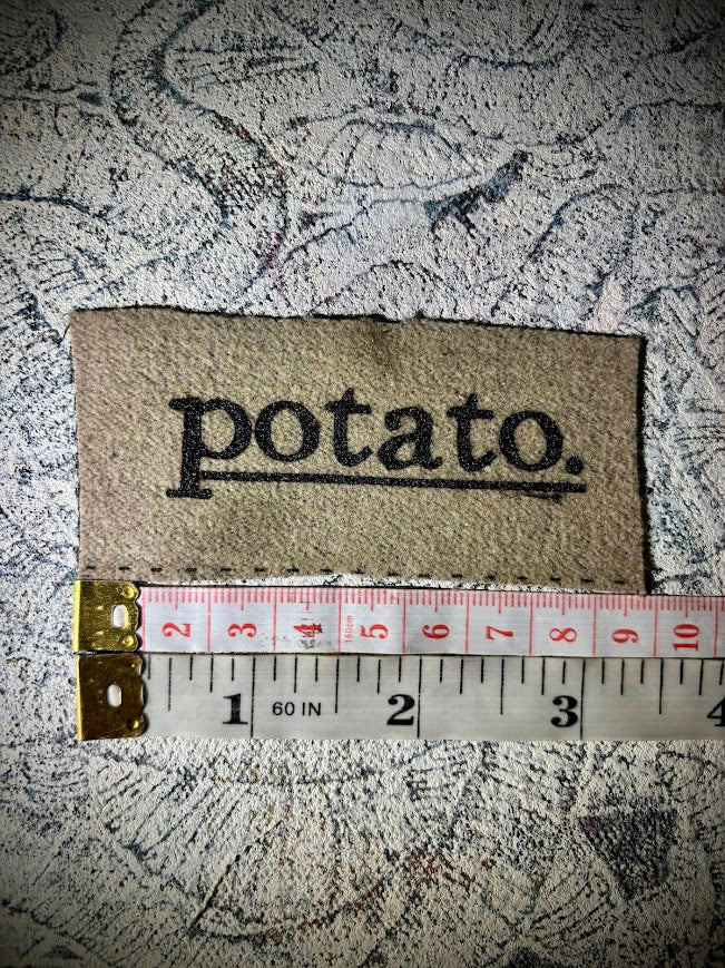 Potato patch. just a tiny patch that says potato.