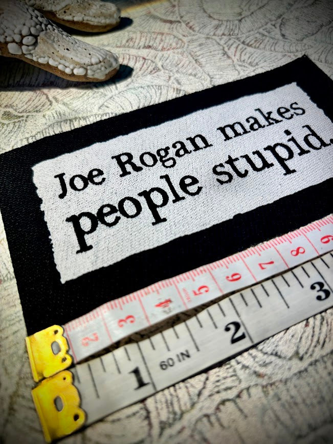 Joe Rogan makes people stupid sew on patch.