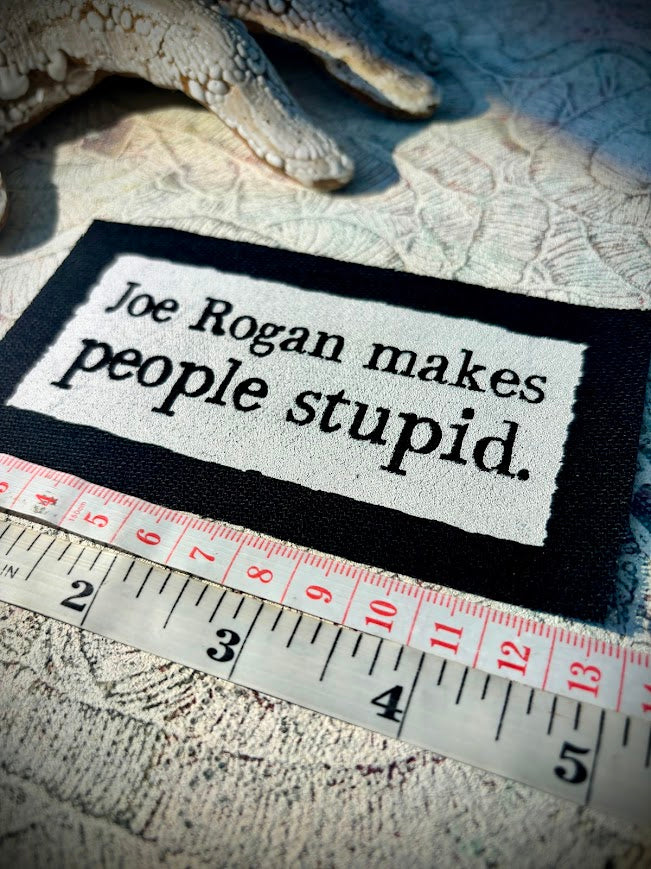 Joe Rogan makes people stupid sew on patch.
