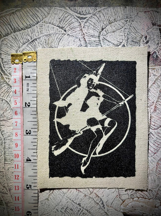 Witch pinup riding a broom sew on patch