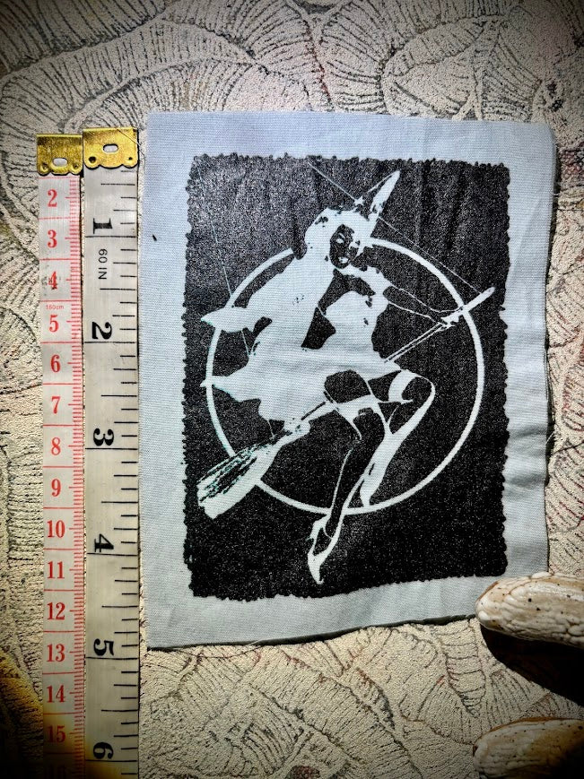 Witch pinup riding a broom sew on patch
