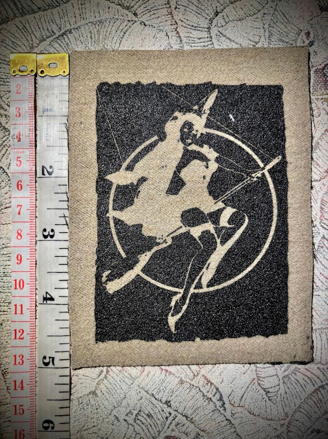 Witch pinup riding a broom sew on patch