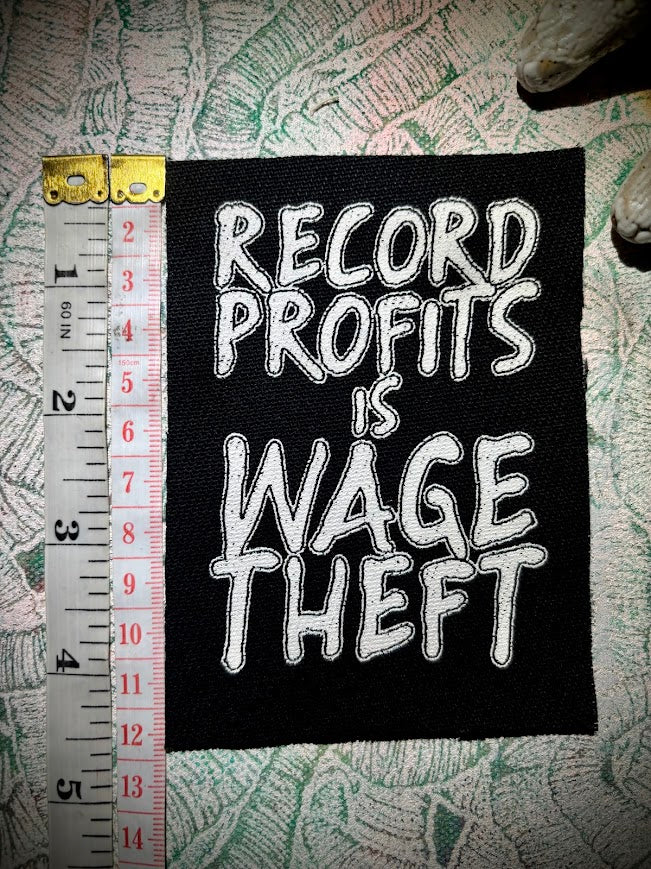 Record profits is wage theft. Sew on patch