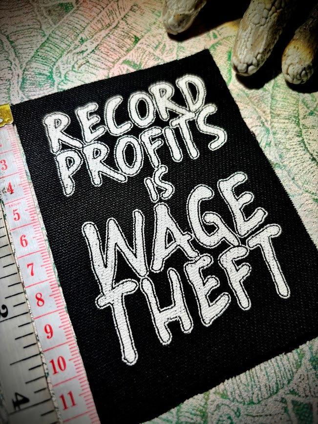 Record profits is wage theft. Sew on patch