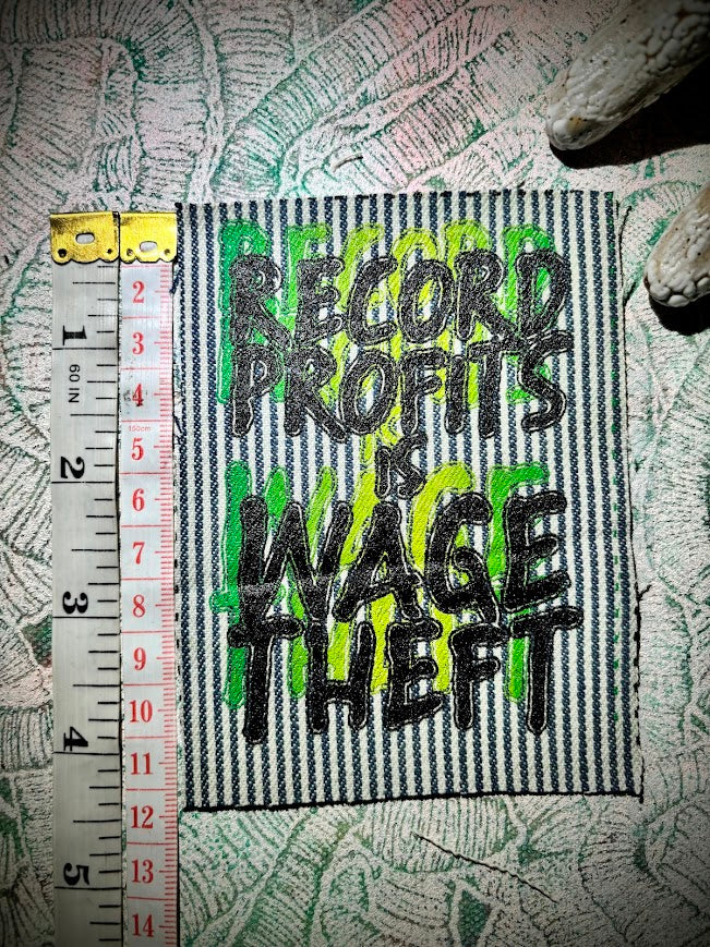 Record profits is wage theft. Sew on patch