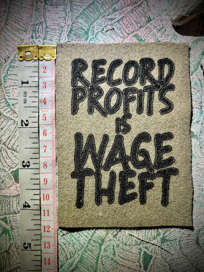 Record profits is wage theft. Sew on patch