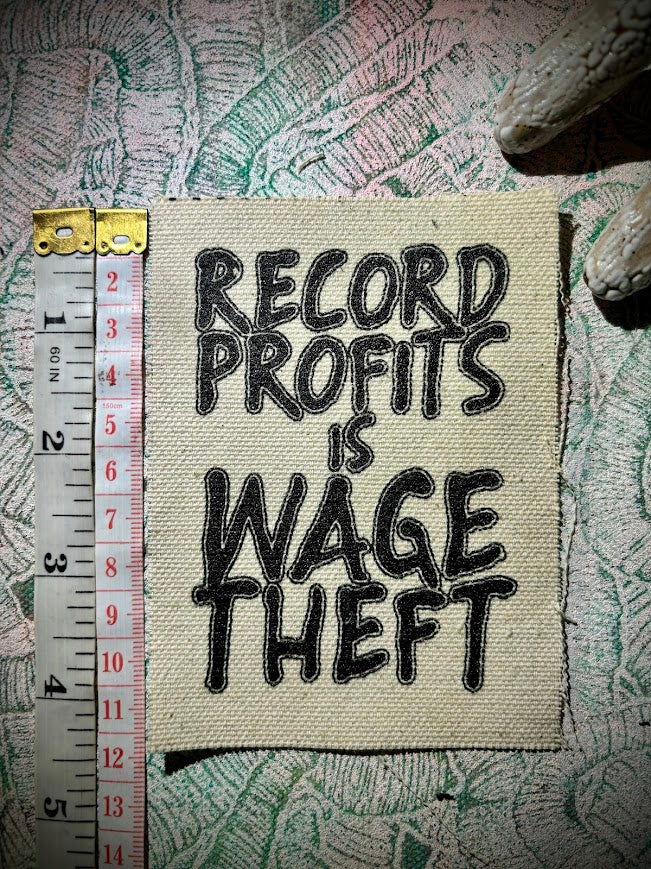 Record profits is wage theft. Sew on patch