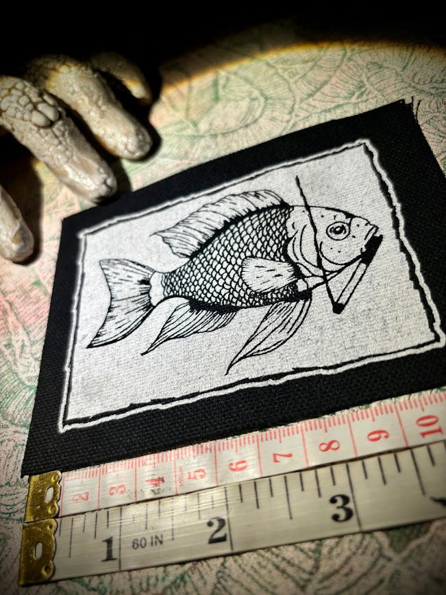 Fish smoking a cigarette patch