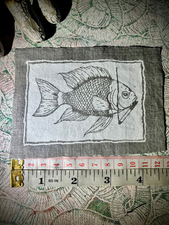 Fish smoking a cigarette patch