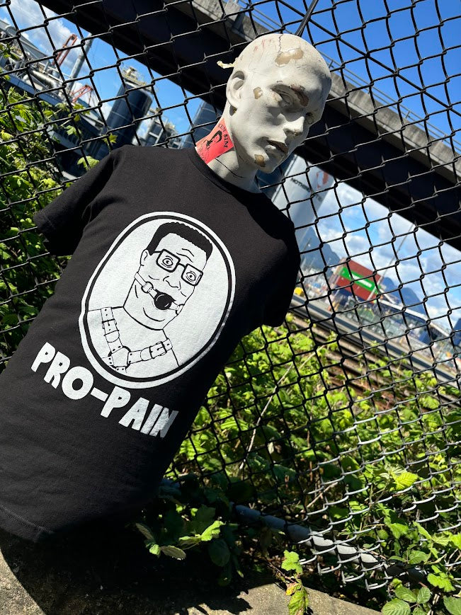 Hank Hill, Pro-pain tee.