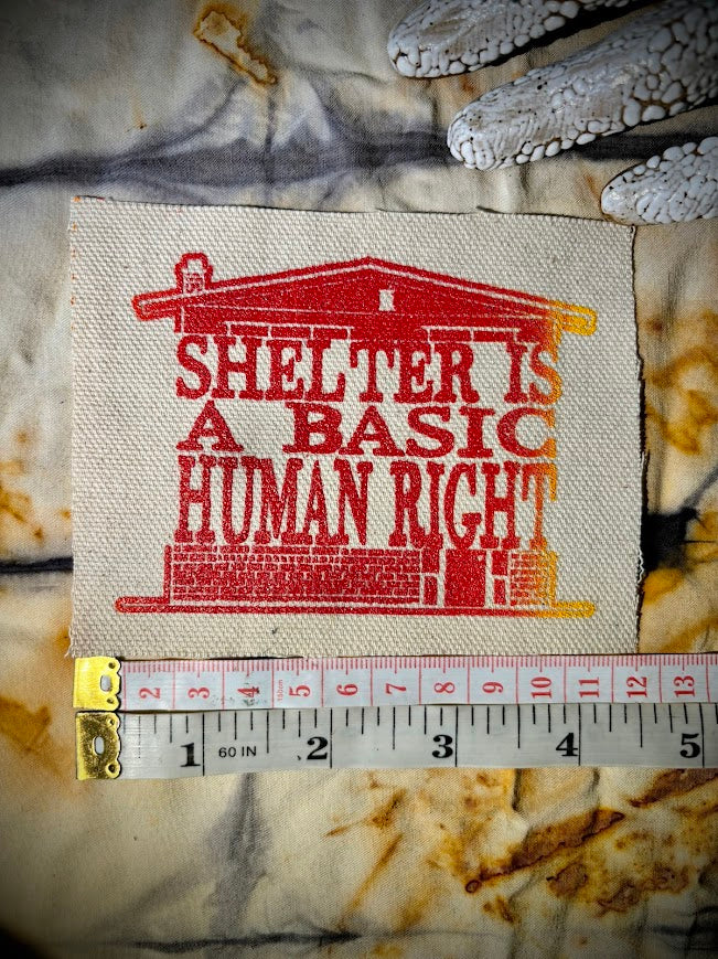 Shelter is a basic human right. sew on patch.