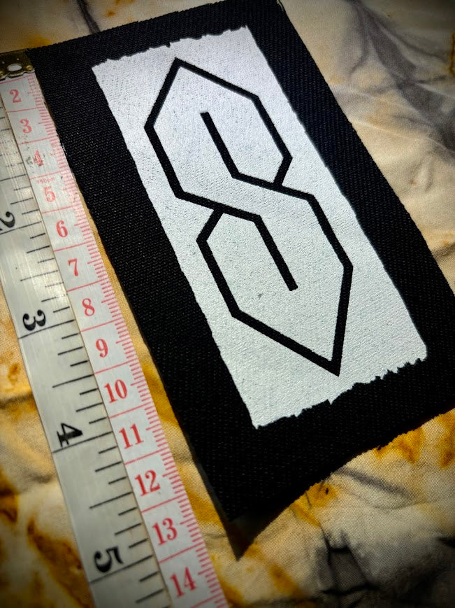 The cool S. that greasy 90's binder S thing sew on patch.