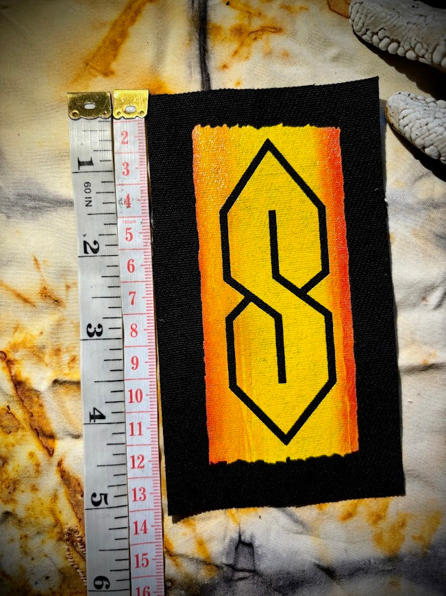 The cool S. that greasy 90's binder S thing sew on patch.