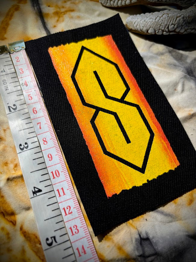 The cool S. that greasy 90's binder S thing sew on patch.