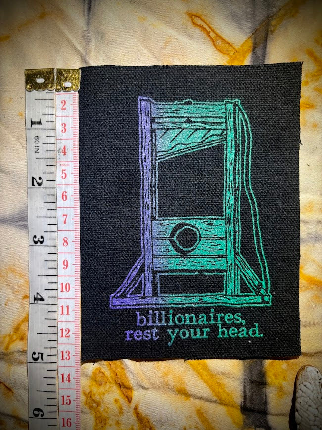 Guillotine sew on patch. Billionaires, rest your head