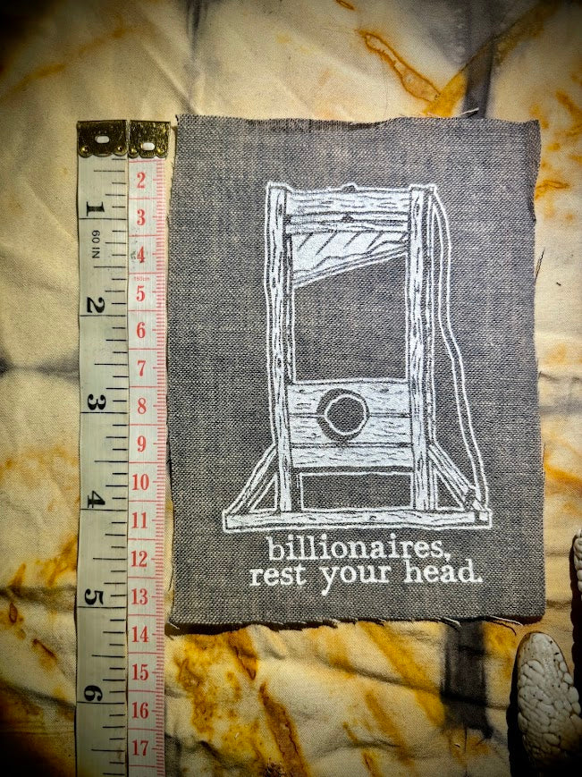 Guillotine sew on patch. Billionaires, rest your head
