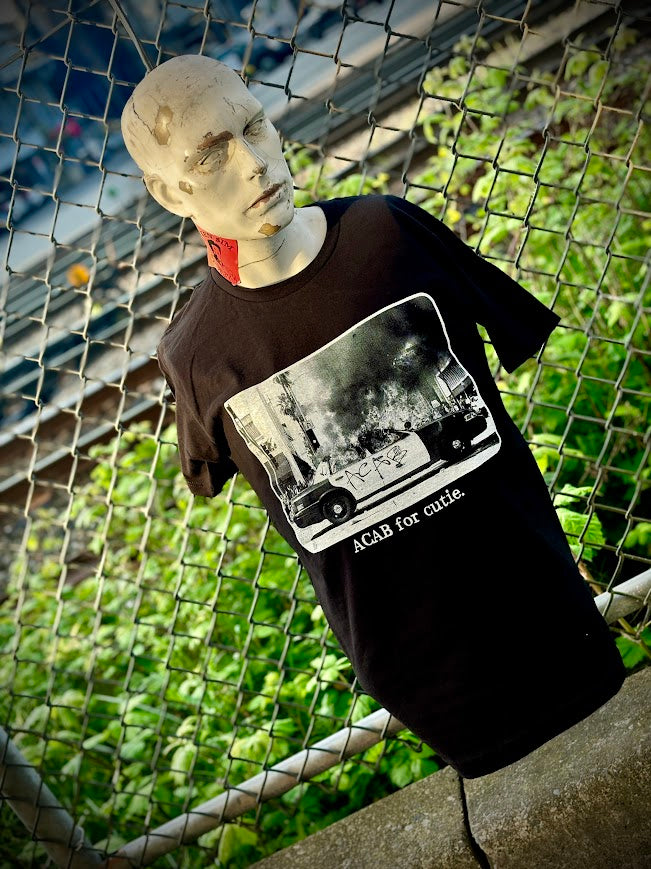 ACAB for Cutie tee. T-shirt with a burning cop car on it