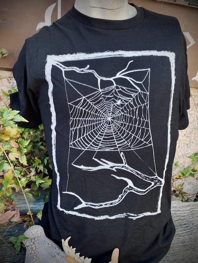 Spider web tee. t-shirt with a spider in their web.