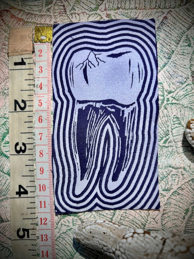Tooth with a toothache patch