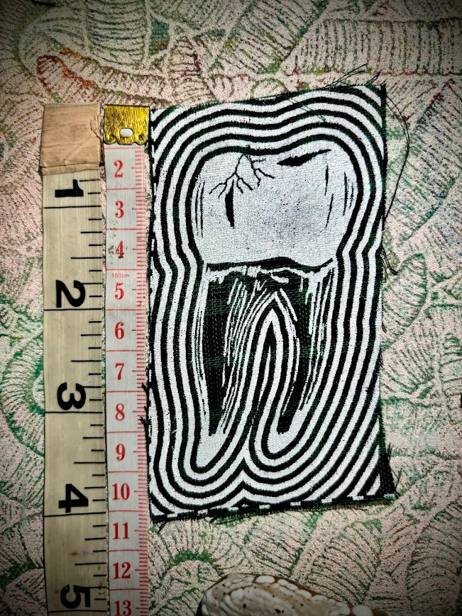 Tooth with a toothache patch