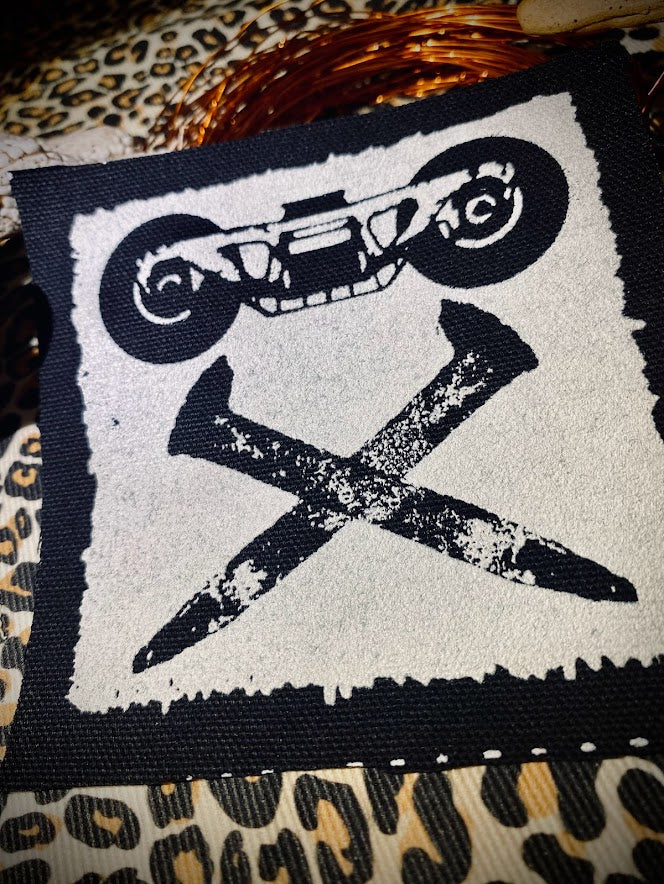 crossed rail spike patch.