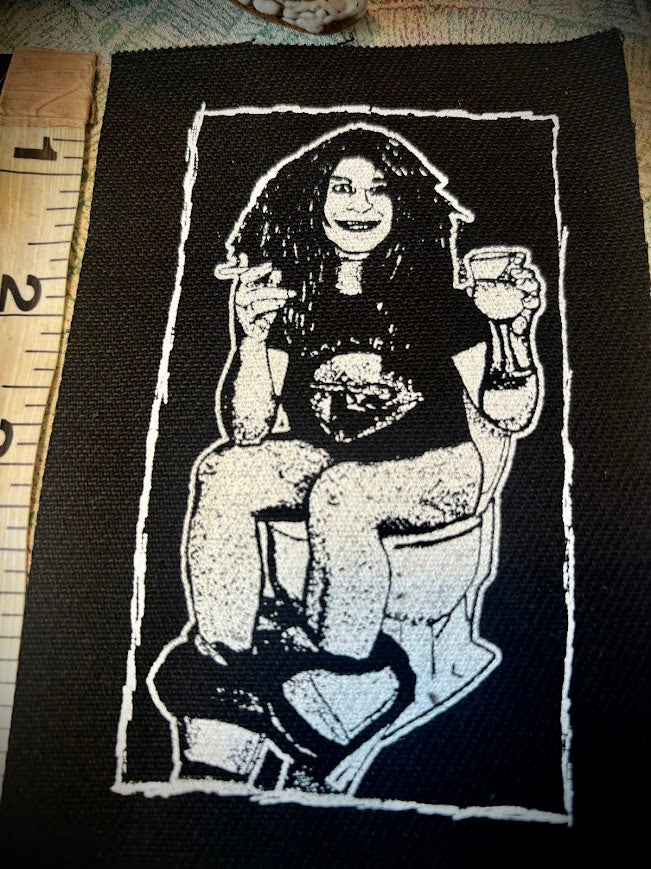 Ozzy Osbourne on the toilet.
