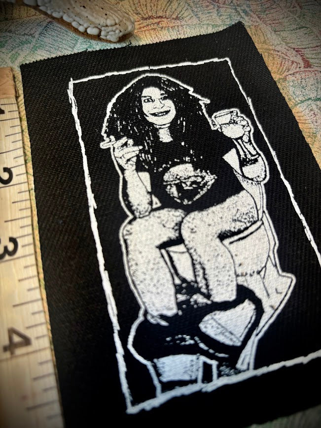 Ozzy Osbourne on the toilet.