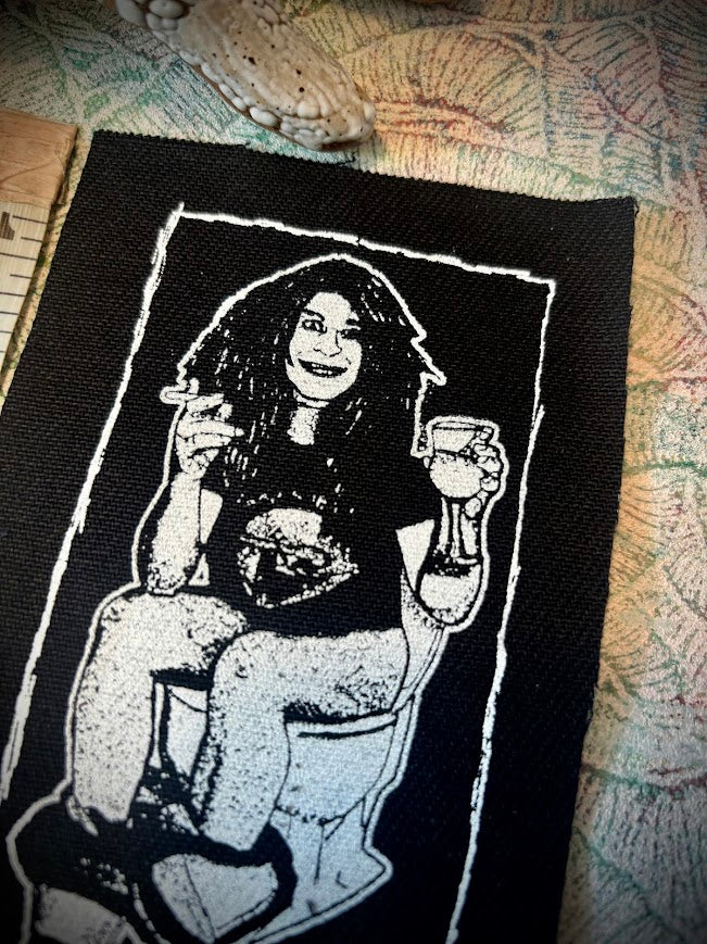 Ozzy Osbourne on the toilet.