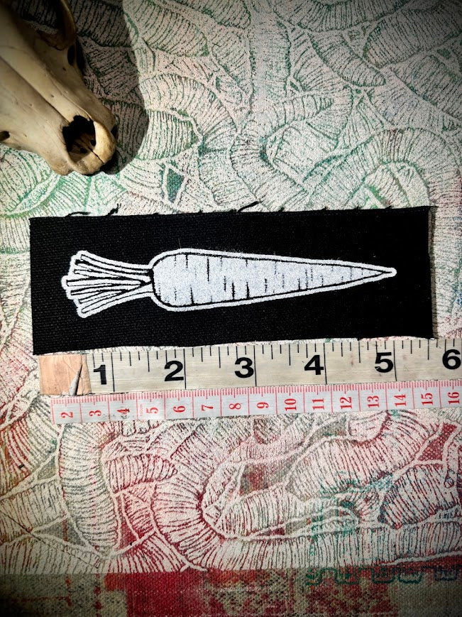 A Carrot, on a patch.