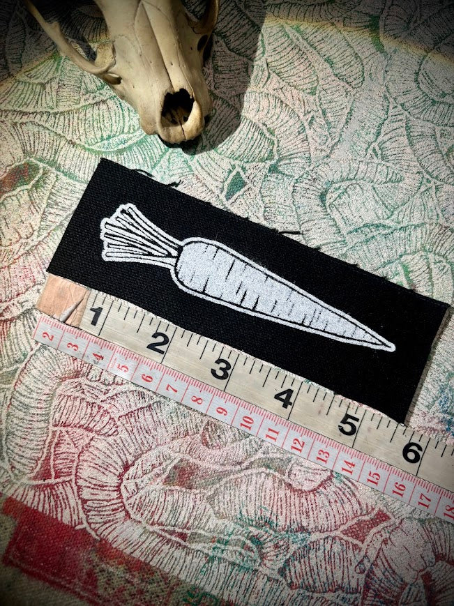 A Carrot, on a patch.