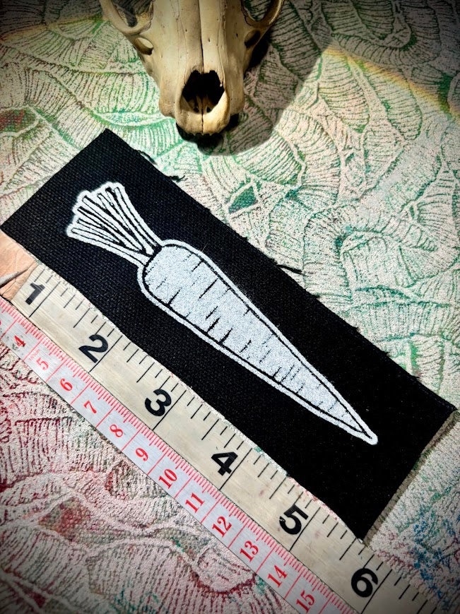 A Carrot, on a patch.
