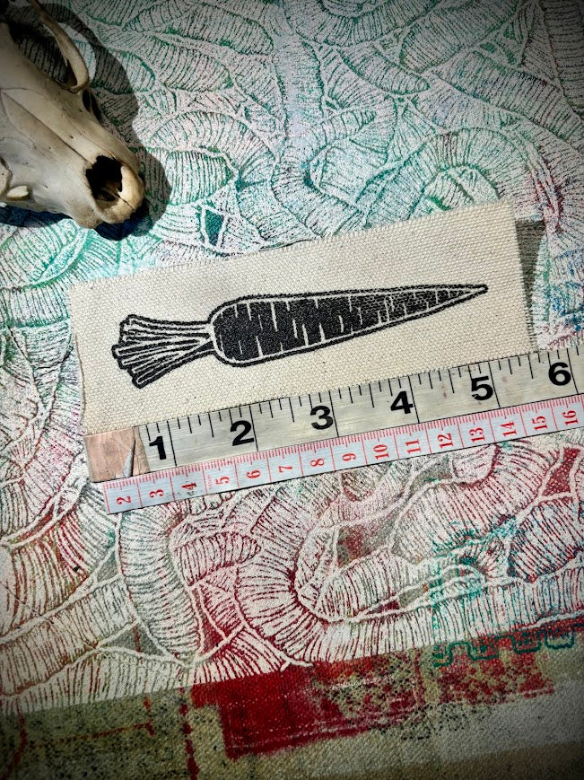 A Carrot, on a patch.