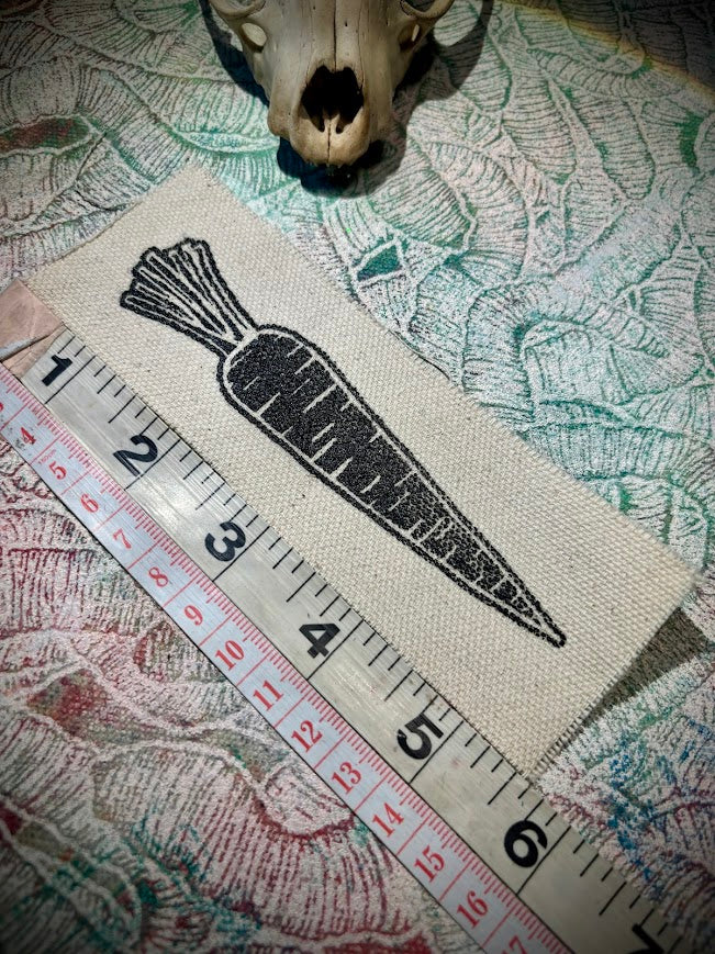 A Carrot, on a patch. that is all