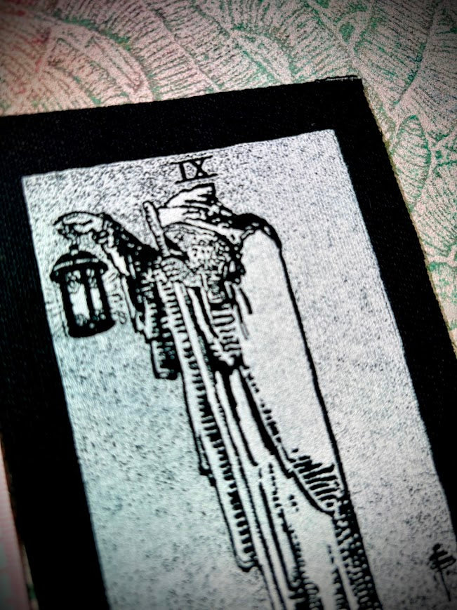 The Hermit tarot card patch.