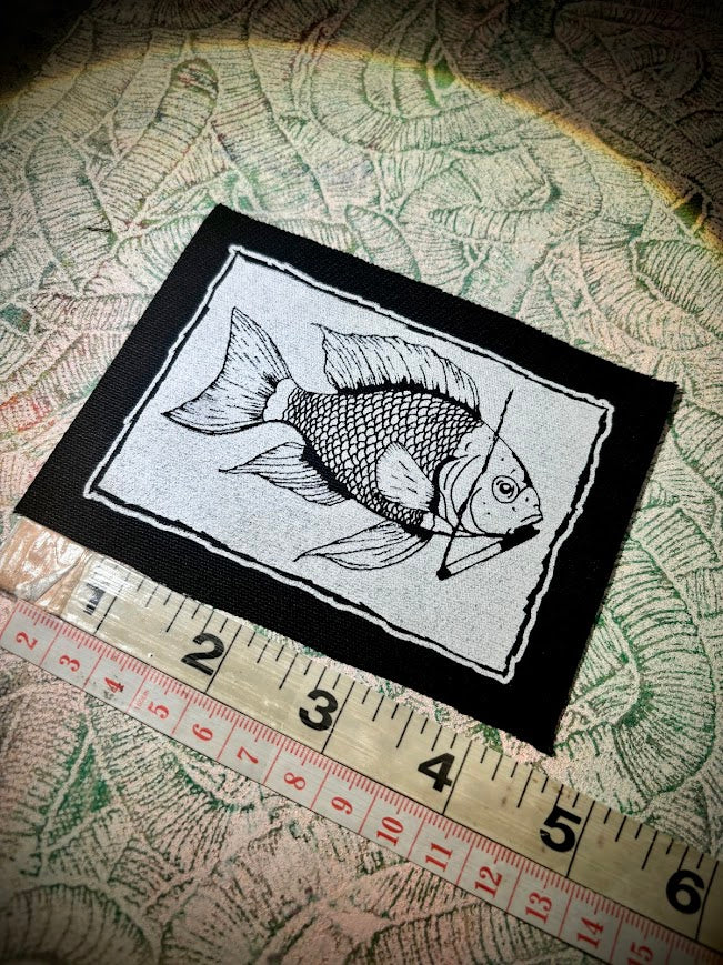 Fish smoking a cigarette patch