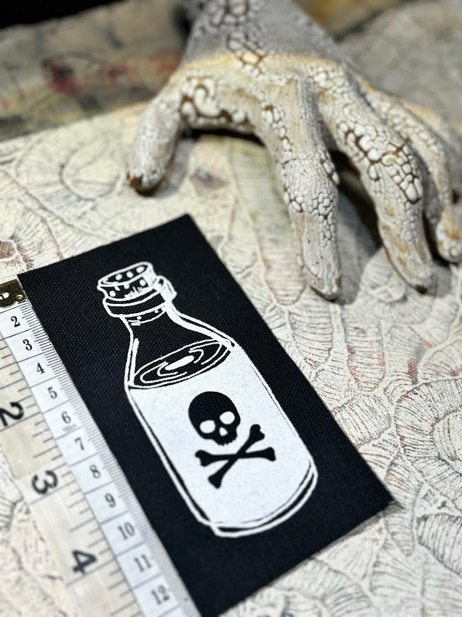 Little bottle of poison patch.