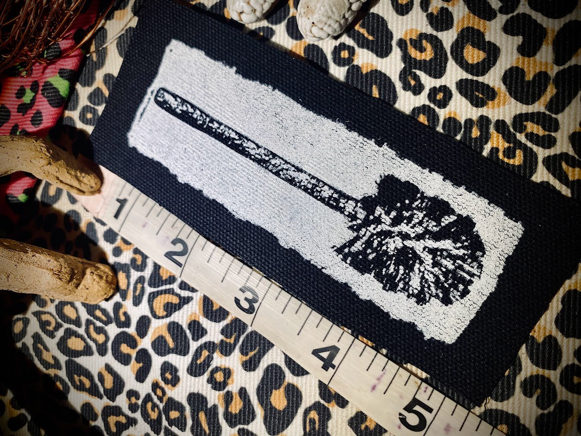 Toilet brush sew on patch.