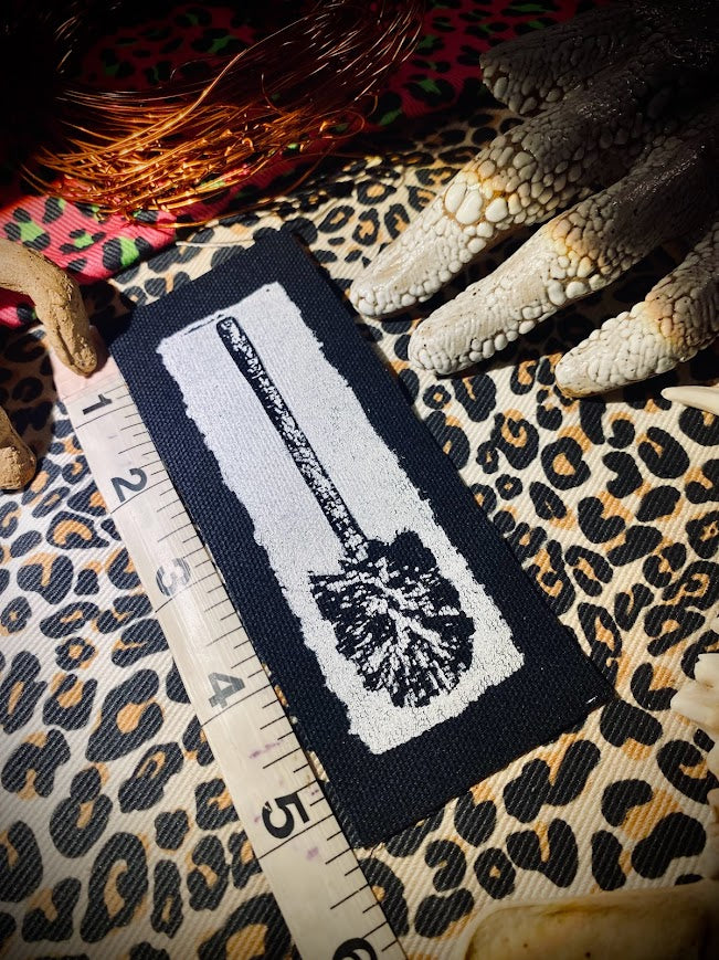 Toilet brush sew on patch.