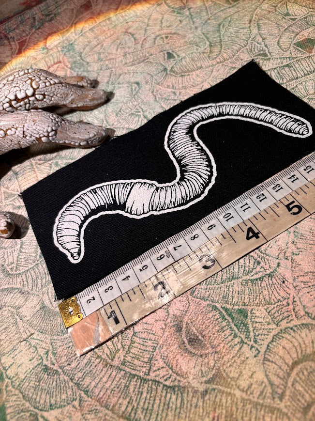 Worm sew on patch.